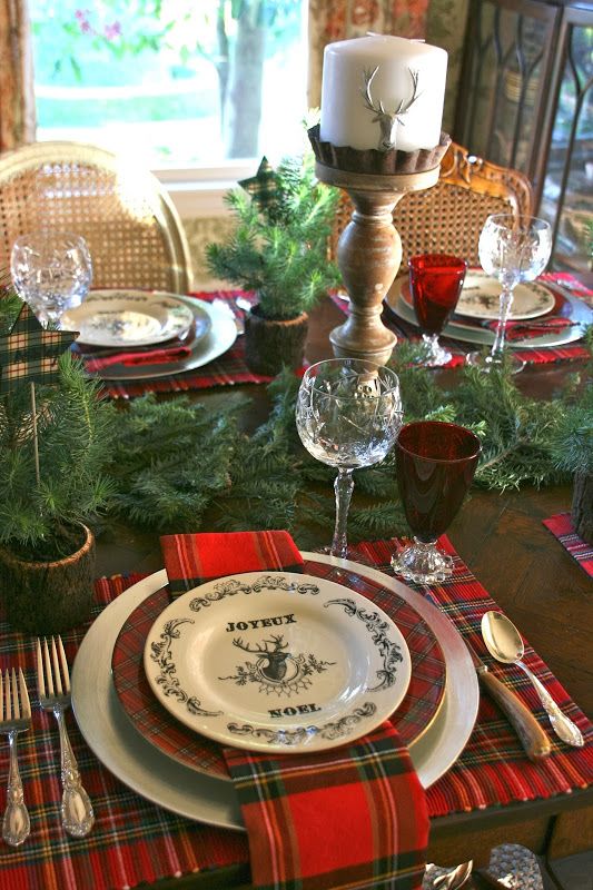 04-plaid-mats-and-plates-an-evergreen-garland-deer-candles-red-glasses-for-a-traditional-feel