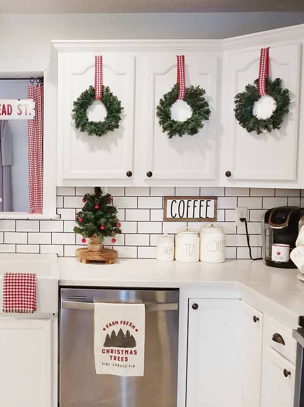 2-christmas-wreaths-on-kitchen-cabinets-@ourcozycottage