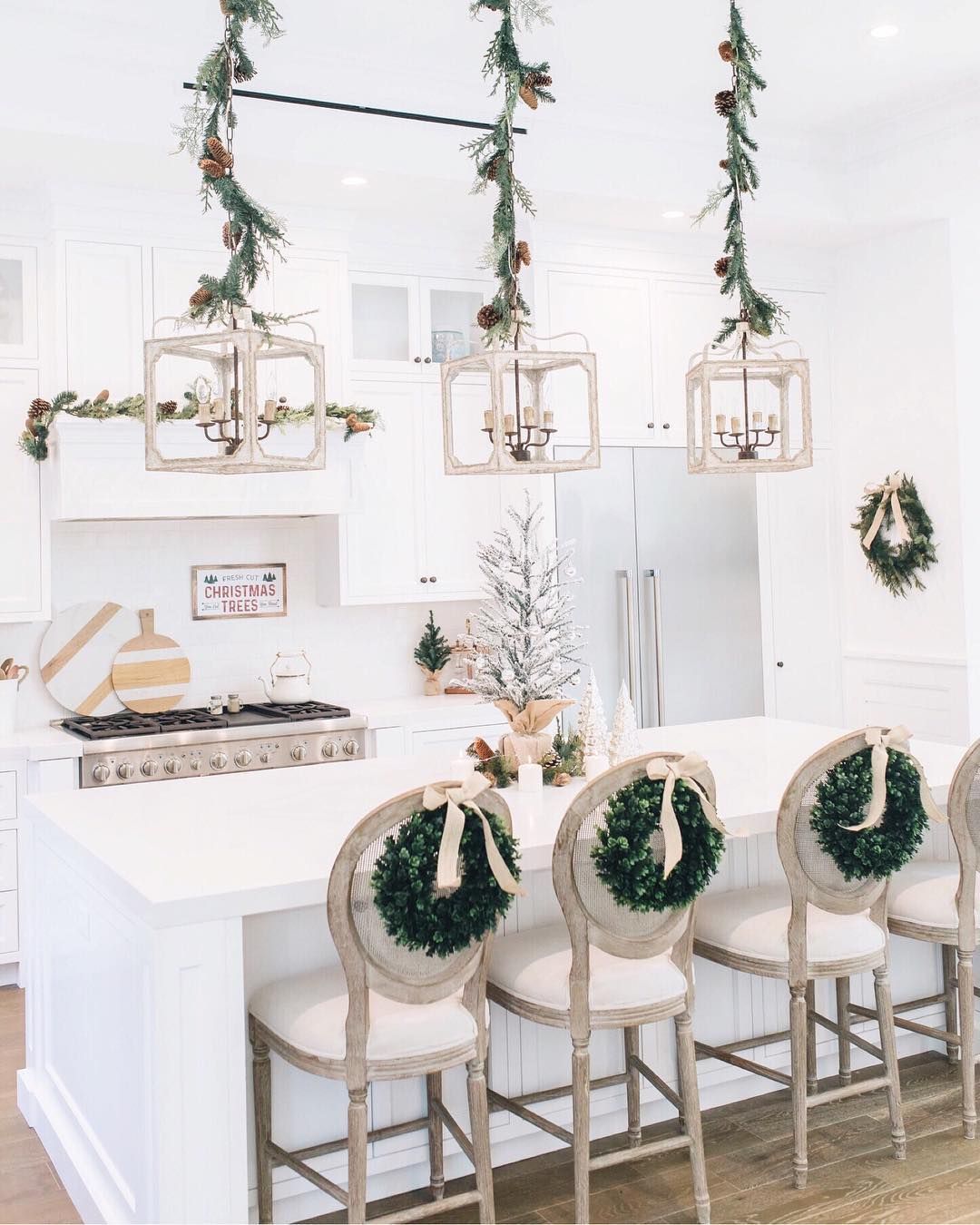 2-wreaths-on-the-back-of-kitchen-bar-chairs-via-@alifedotowsky