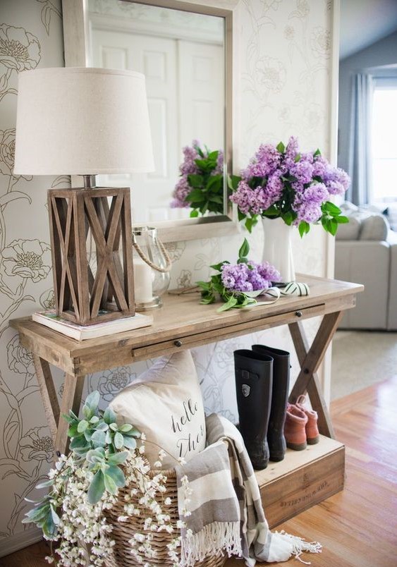 03-a-console-styled-with-fresh-blooms-and-a-basket-with-faux-blooms-and-greenery-for-a-farmhouse-space-1