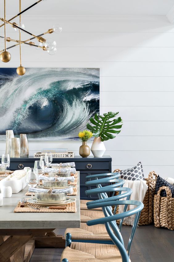 04-an-ocean-swirl-artwork-in-the-dining-room-makes-a-bold-statement