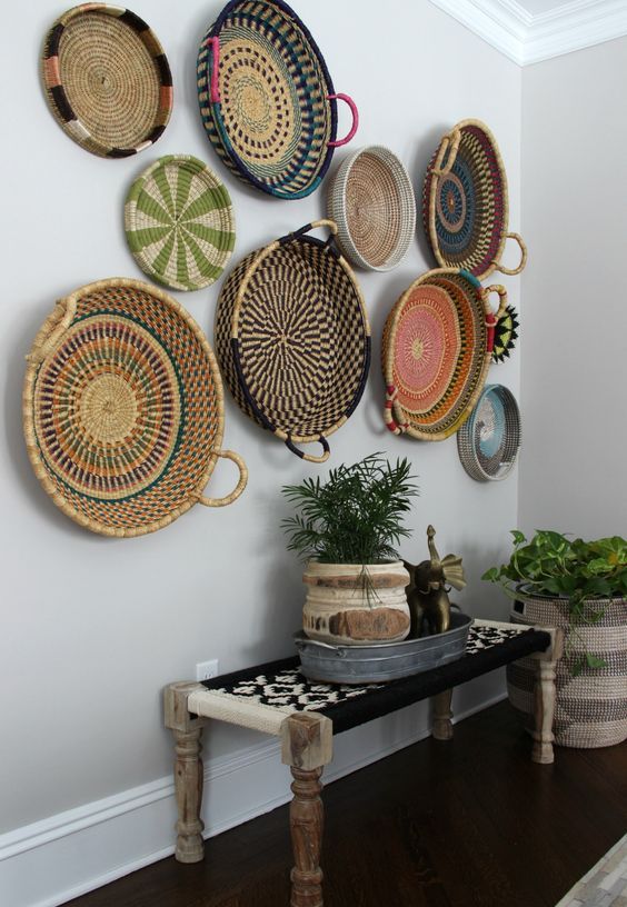 21-a-boho-woven-and-wooden-bench-an-arrangement-of-colorful-baskets-and-basket-planters