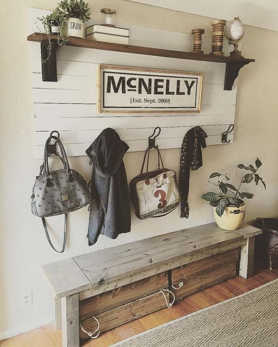4-13-a-wooden-bench-with-drawers-underneath-and-a-wooden-shelf-over-it-for-a-rustic-space
