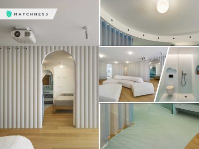 Contemporary white apartment with an open living space that feels dramatic fi