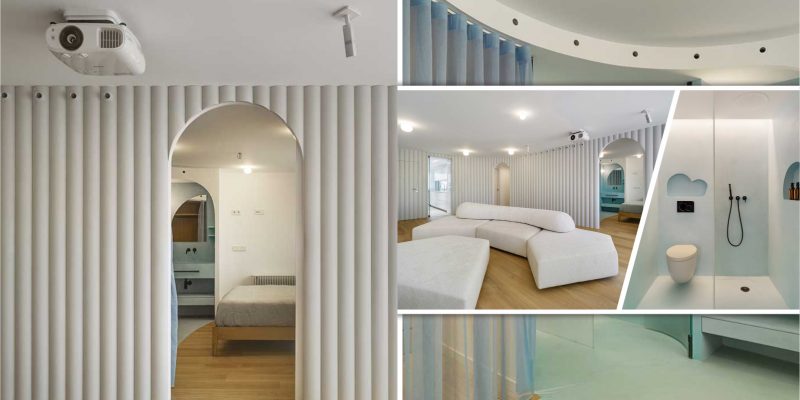 Contemporary white apartment with an open living space that feels dramatic fi
