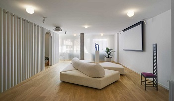 Contemporay white apartment with an open living space that feels dramatic 1