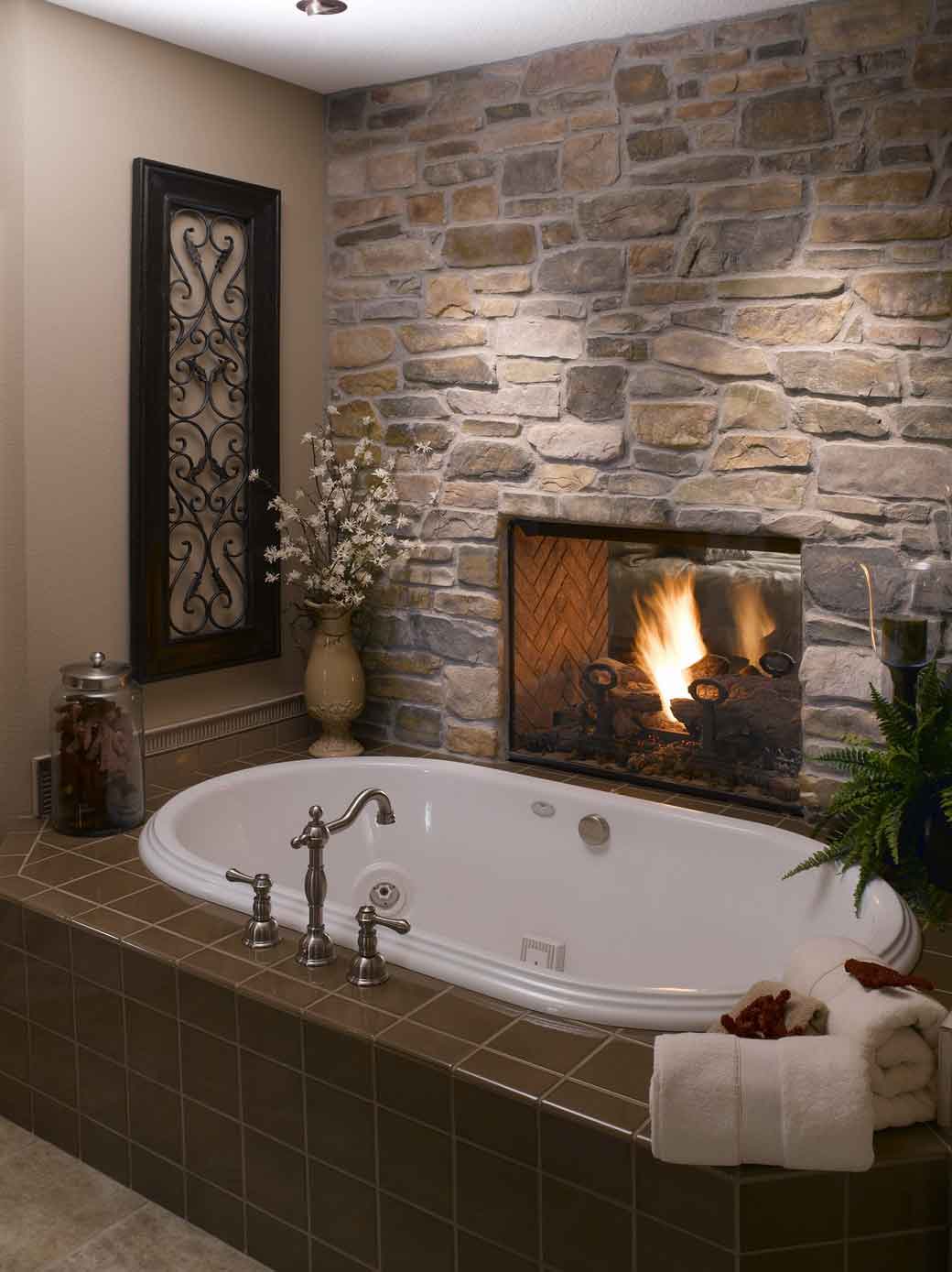 Elegant modern stone bathroom bathtub fireplace design ideas