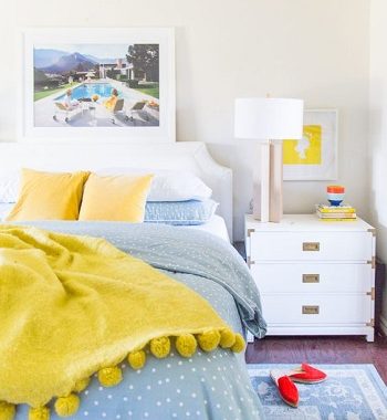 With sunny yellow bedding