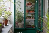 A bold greenhouse with planters