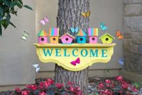Cheery birdhouse welcome sign
