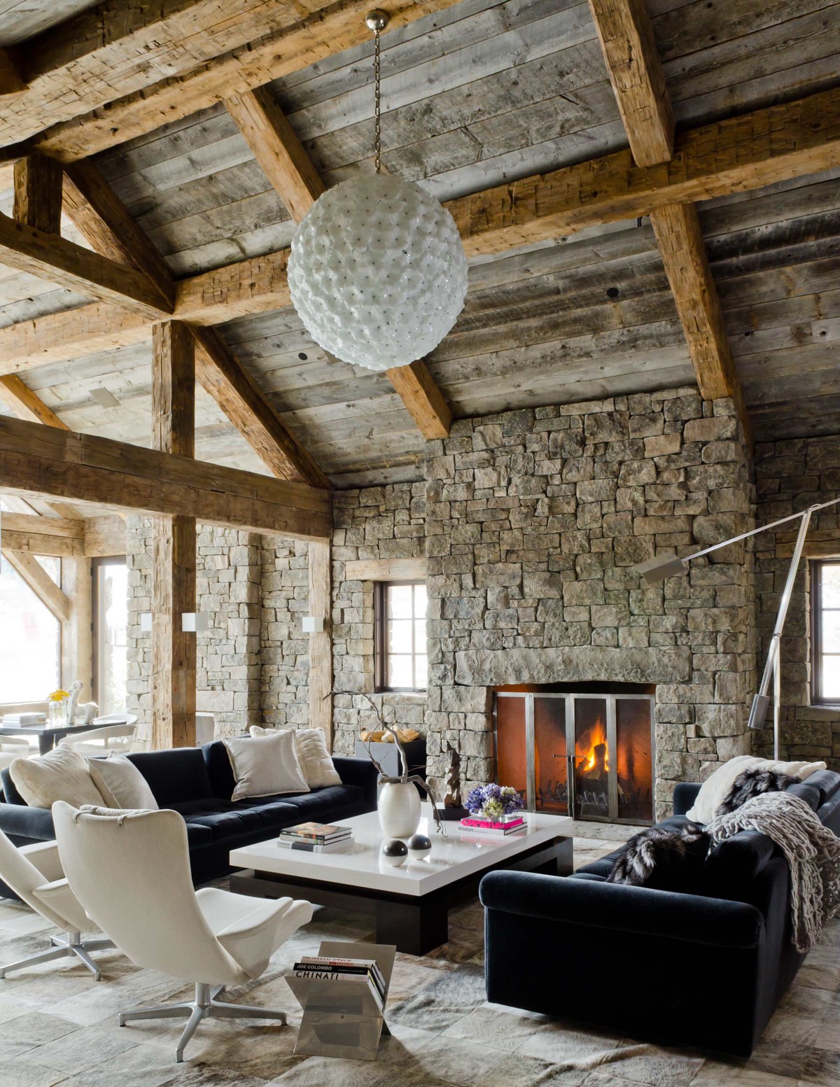 Dimpled-chandelier-stone-fireplace-rustic-living-room-set