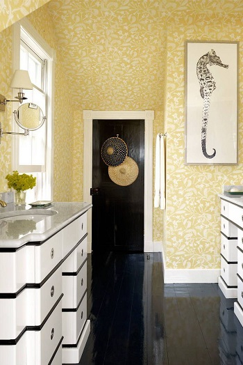 With sandy yellow wallpaper