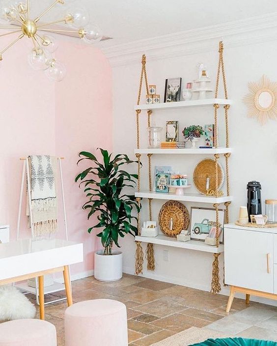 2-15-a-hanging-shelving-unit-with-white-shelves-and-simple-ropes-with-long-fringe-add-a-boho-feel-to-the-glam-space