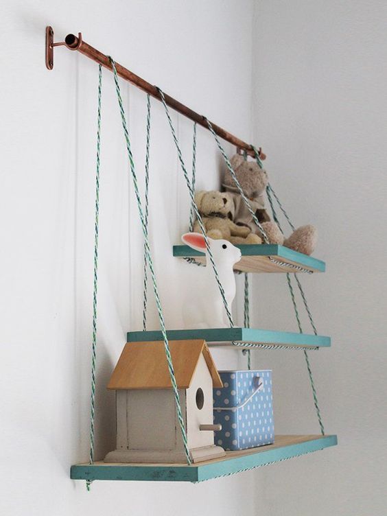 4-06-a-metal-holder-with-several-matching-shelves-that-are-different-in-size-will-add-texture-and-a-fun-color-touch-to-the-space