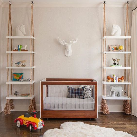4-25-shelving-units-hanging-on-ropes-with-tassels-on-both-sides-of-the-crib-is-a-cool-idea-that-brings-a-relaxed-feel-to-the-space