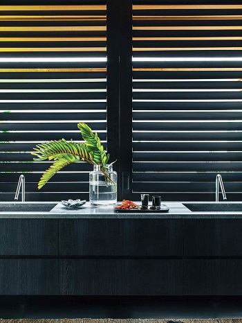 Bathroom with black cabinet