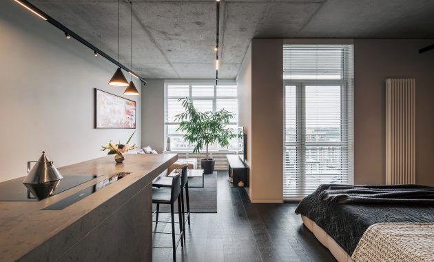 Minimalist apartment with a window overlooking the city 1