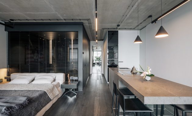 Minimalist apartment with a window overlooking the city 3