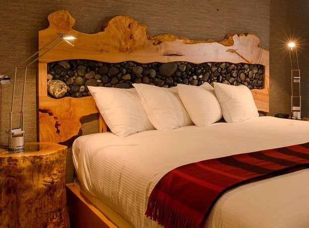 Wall-mounted-headboard-to-the-bed-of-a-large-board-inlaid-stones