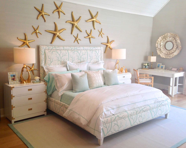 Whimsical-teenage-girl-room-decor-with-gold-stars-on-the-wall-and-plush-throw-pillows