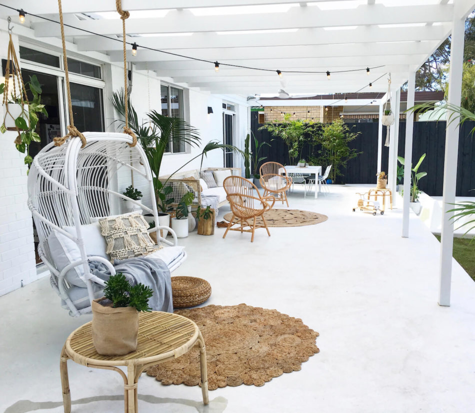 White-patio-design-with-hanging-chair