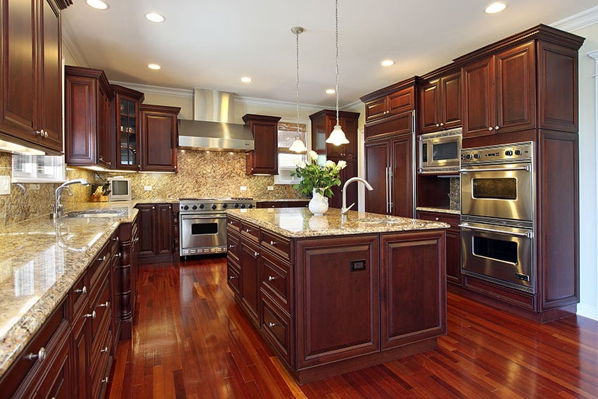 Cherry-kitchen-with-granite-counters-and-stainless-steel-appliances