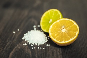 Fresh lemon and table salt DIY Quick Brilliant Ways To Clean All Your Copper Cookware