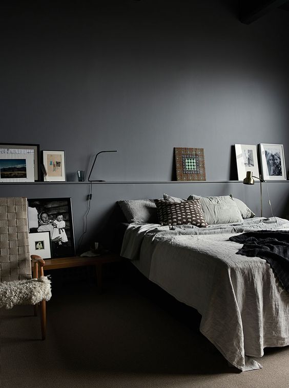 Graphite-grey-walls-functional-design-and-warm-woods-to-soften-the-look