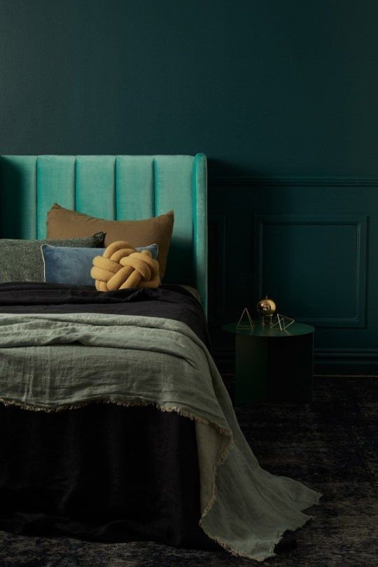 Green-moody-color-palette-with-bold-dark-shades-and-geometric-decorations