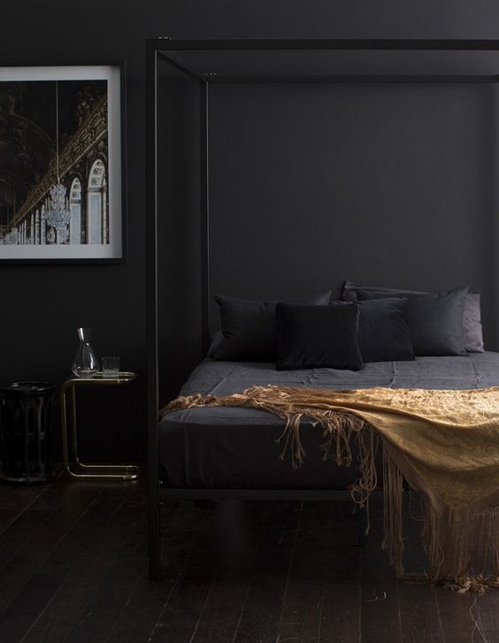 Matte-black-bedroom-with-metallic-details