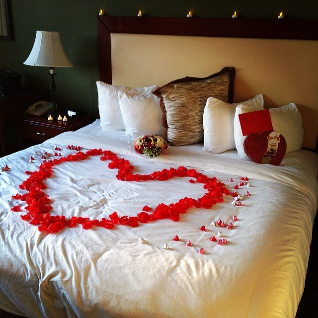 Romantic-gestures-rose-petal-heart