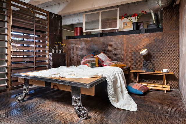 Steel-diamond-plates-make-this-room-super-unusual-but-a-bed-is-still-the-centerpiece