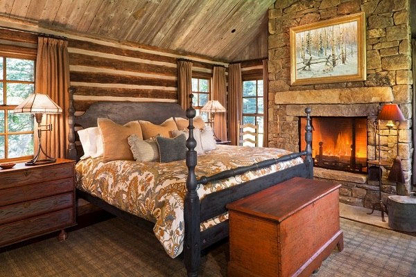 Stone-fireplace-design-ideas-bedroom-interior-wooden-bed-neutral-colors