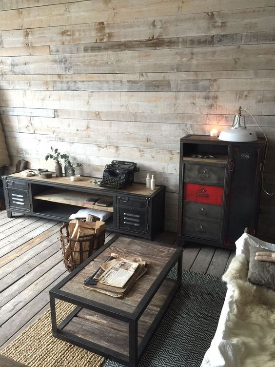 Weathered-wood-floor-and-walls-an-industrial-wood-and-metal-coffee-table-vintage-metal-furniture