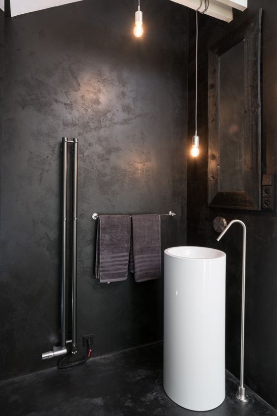 06-industrial-bathroom-with-a-white-free-standing-sink-that-pops-up