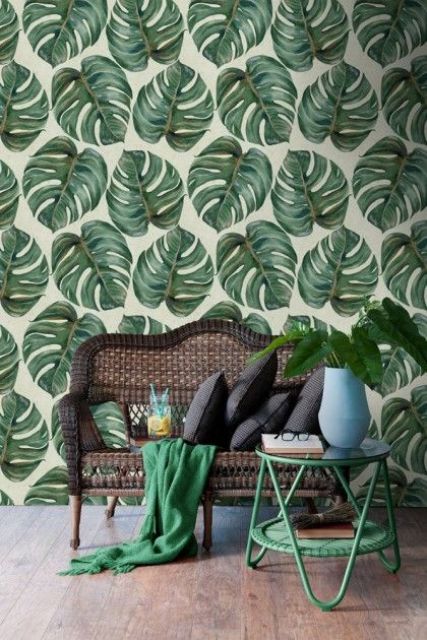 2-15-monstera-leaf-printed-wallpaper-echoes-with-a-green-coffee-table-and-blanket