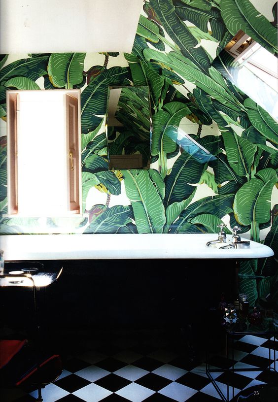 2-18-retro-inspired-bathroom-with-palm-leaf-print-wallpaper-and-a-black-bathtub