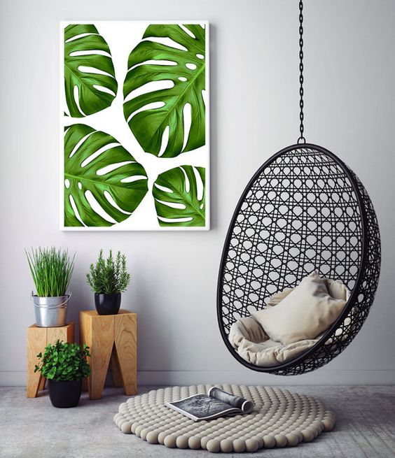 2-24-a-colorful-monstera-leaf-wall-art-echoes-with-the-greenery-below