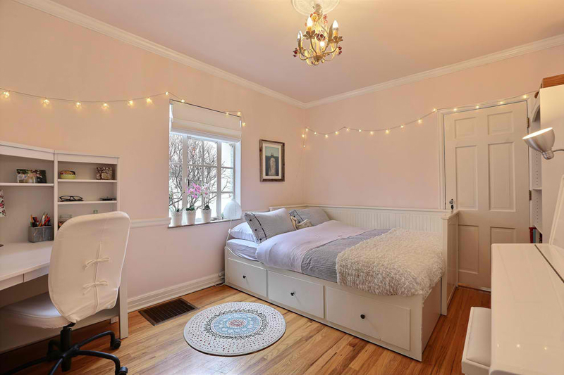 Contemporary bedroom with string lights