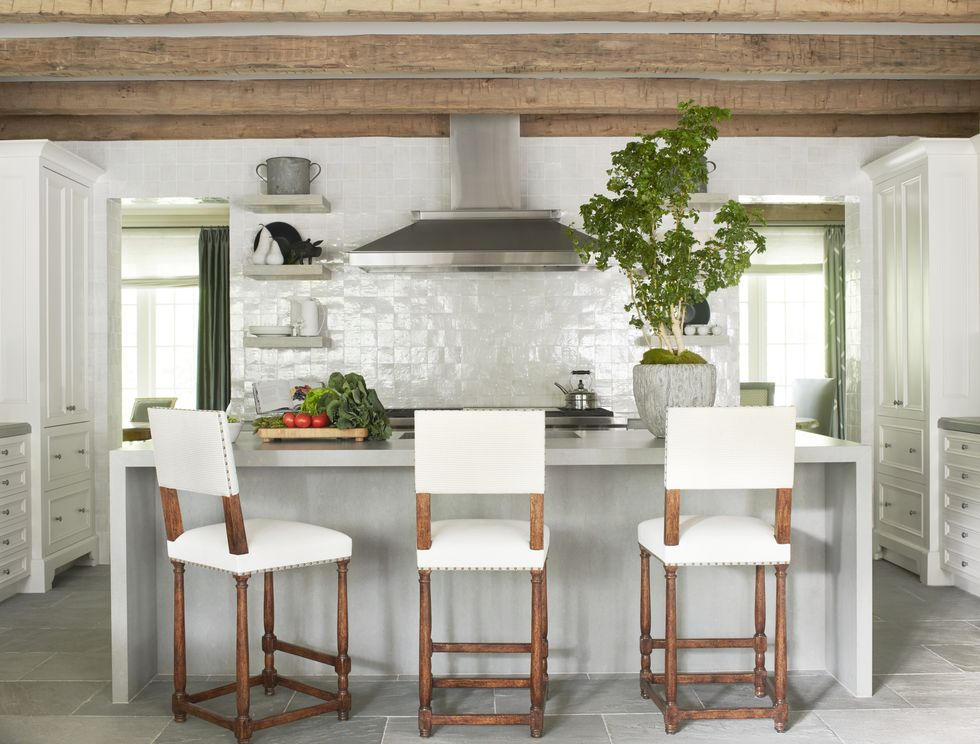 Kitchen with glossy tile backsplash