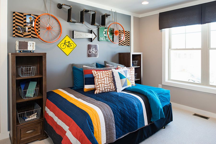 Signs-on-the-wall-and-orange-bicycle-wheels-used-to-decorate-kids-room