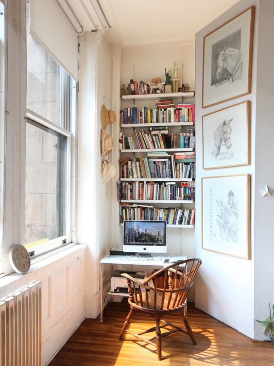 A-small-working-nook-with-built-in-bookshelves-a-small-desk-and-a-vintage-chair-is-a-stylish-eclectic-space-3