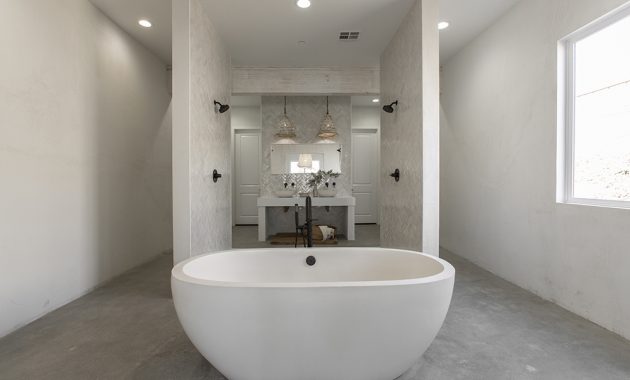 Bathroom-white-standing-tub-rock-the-block