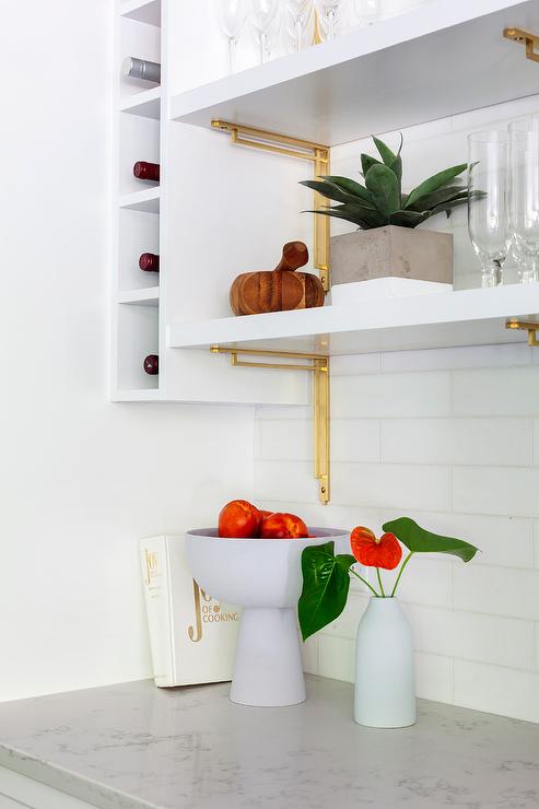Stacked-white-and-gold-kitchen-shelves