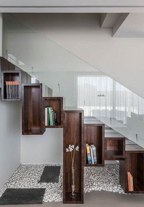 Whimsy-dark-stained-open-box-shelves-form-steps-and-give-storage-space-at-the-same-time