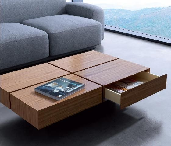 02-a-coffee-table-that-features-four-drawers-for-storage-and-a-cool-laconic-look