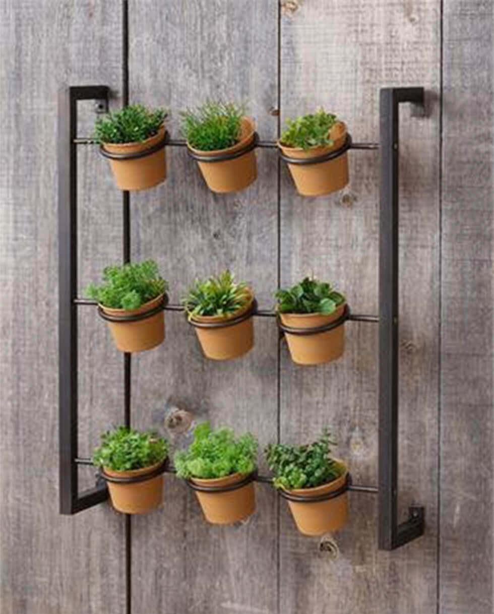 1-02-wall-mounted-herb-garden-on-a-wood-pallet-wall