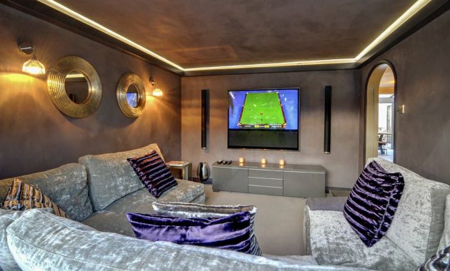 1-modern-industrial-home-theater-that-is-draped-entirely-in-gray-76815