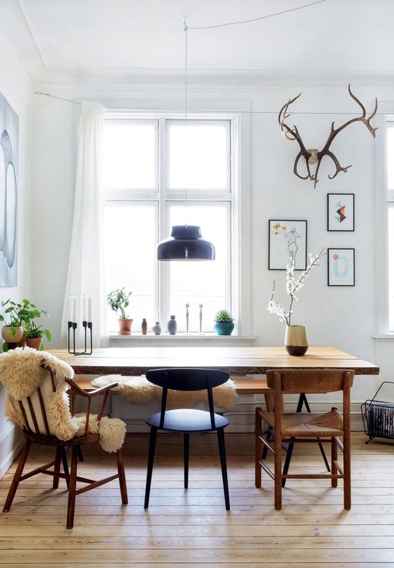 16-a-light-colored-wood-floor-rich-stained-chairs-and-a-black-one-for-a-bold-and-chic-mix