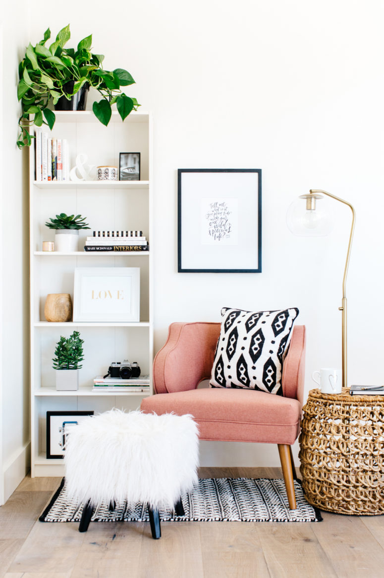 2-05-a-cozy-corner-with-a-pink-armchair-a-floor-lamp-and-some-poufs-is-an-ideal-reading-nook-and-is-very-inviting-775x1164-2